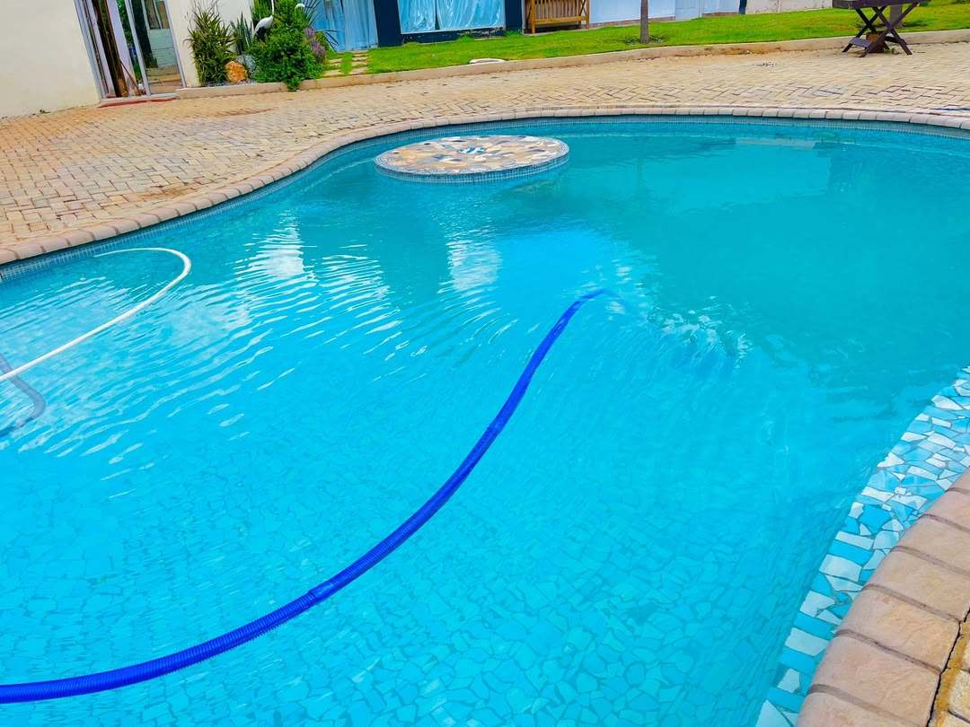 Garden swimming pool at Highlands Lodges, accommodation in Highlands, Harare